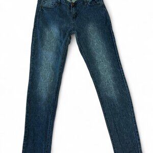 Sapphire Ink denim blue jeans with black floral background.
